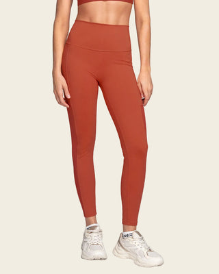 Legging deportivo con bolsillo lateral y detalles en SmartLace®#color_336-rojo-canela