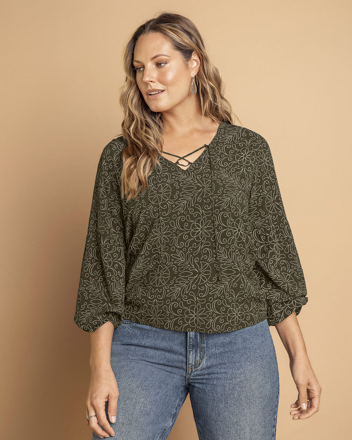 Blusa manga larga con tiras en escote en V