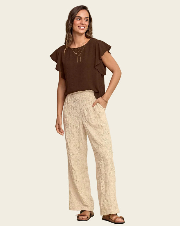 Blusa con boleros en mangas en tela craquelada