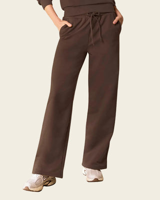 Pantalón bota amplia con elástico y tira anudable en cintura#color_c23-cafe-chocolate