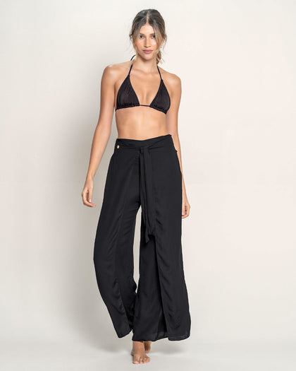 Pantalón playero tipo gaza anudable en el frente en algodón orgánico y rayón#color_700-negro