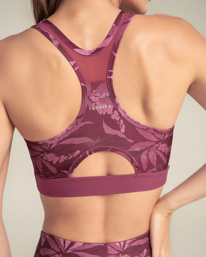 Top deportivo con espalda atlética en material de secado rápido#color_394-estampado-flores-vino