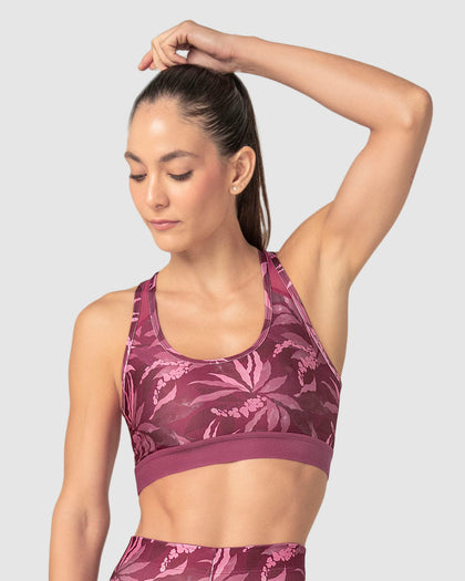 Top deportivo con espalda atlética en material de secado rápido#color_394-estampado-flores-vino