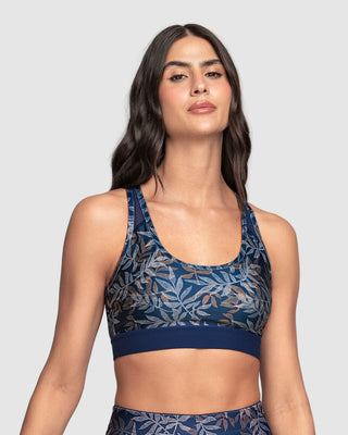 Top deportivo con espalda atlética en material de secado rápido#color_a04-estampado-hojas
