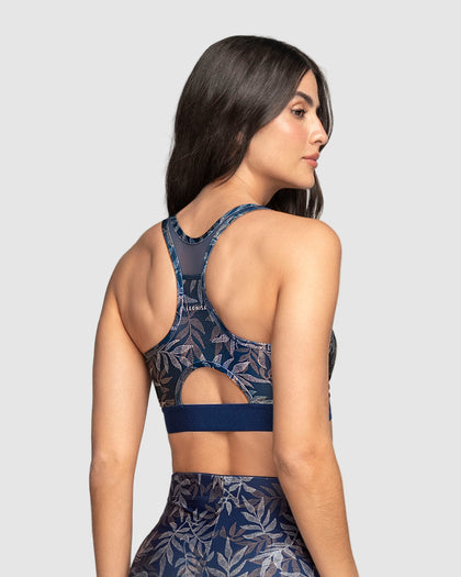 Top deportivo con espalda atlética en material de secado rápido#color_a04-estampado-hojas