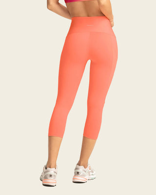 Capri de control en abdomen y muslos con bolsillo lateral#color_244-naranja