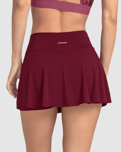 Falda deportiva con short interno con bolsillo#color_220-vinotinto