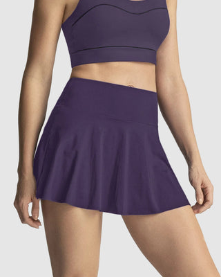 Falda deportiva con short interno con bolsillo#color_450-morado