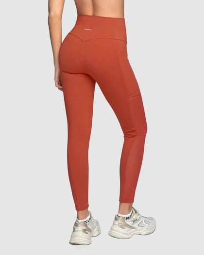 Legging deportivo con bolsillo lateral y detalles en SmartLace®#color_336-rojo-canela