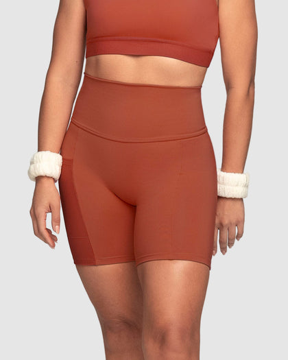 Short ciclista con bolsillo lateral y compresión de abdomen#color_336-rojo-canela