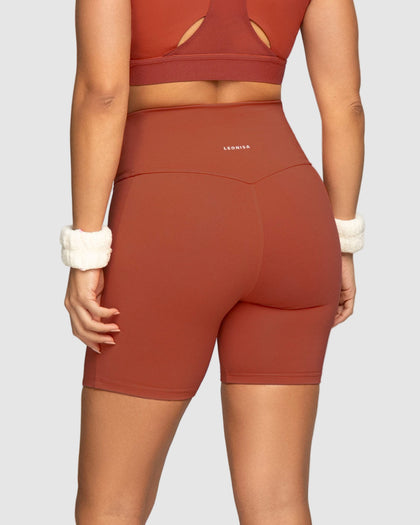 Short ciclista con bolsillo lateral y compresión de abdomen#color_336-rojo-canela