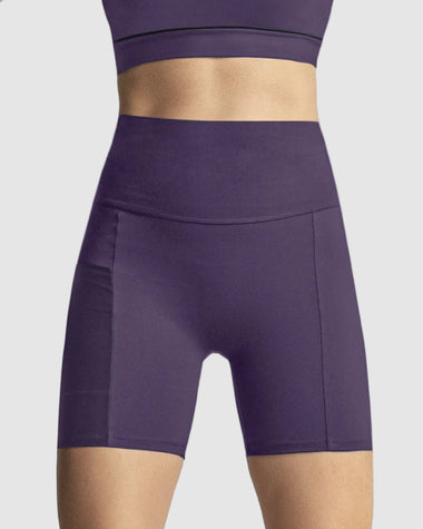 Short ciclista con bolsillo lateral y compresión de abdomen#color_450-morado