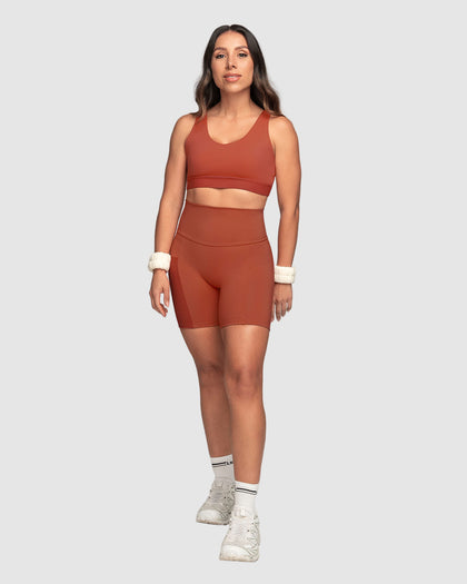 Top deportivo espalda atlética con detalles en SmartLace®#color_336-rojo-canela