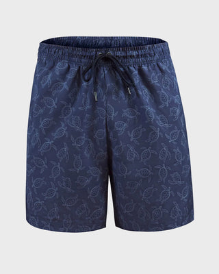 Pantaloneta de baño masculina con práctico bolsillo al lado derecho#color_a61-estampado-azul-tortugas