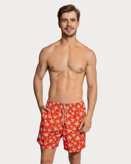 Pantaloneta de baño masculina con práctico bolsillo al lado derecho#color_a70-estampado-palmeras