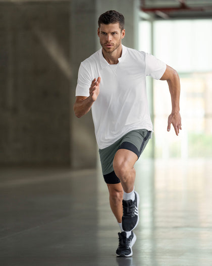 Camiseta deportiva transpirable con cuello tipo polo#color_000-blanco