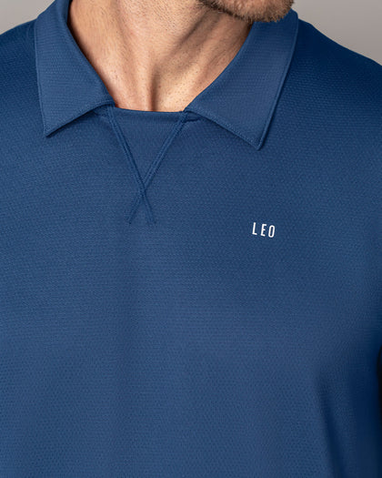Camiseta deportiva transpirable con cuello tipo polo#color_559-azul-oscuro