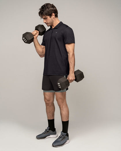 Camiseta deportiva transpirable con cuello tipo polo#color_700-negro