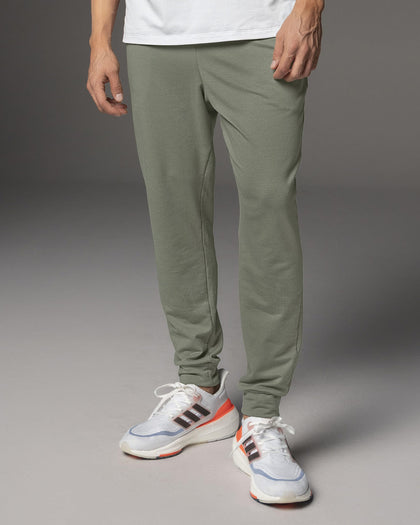 Jogger deportivo estilo sudadera con bolsillos laterales funcionales#color_198-verde-medio