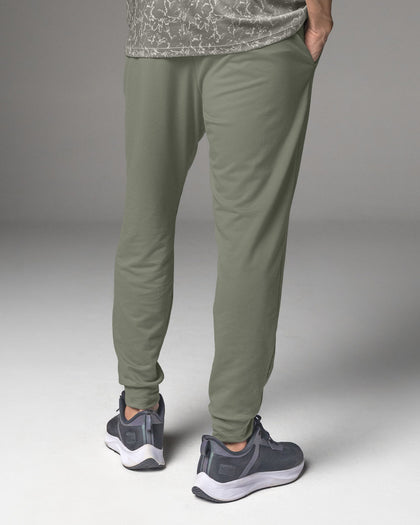Jogger deportivo estilo sudadera con bolsillos laterales funcionales#color_198-verde-medio
