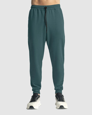 Jogger deportivo estilo sudadera con bolsillos laterales funcionales#color_678-verde