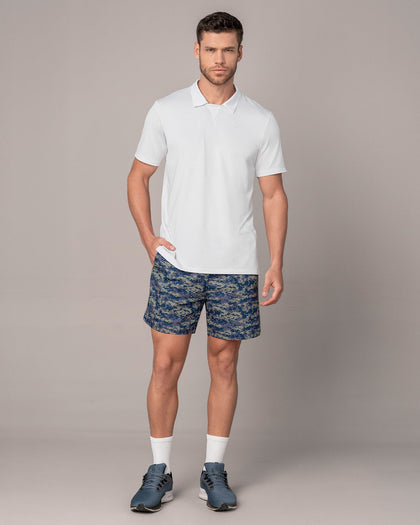 Pantaloneta deportiva con bolsillos funcionales#color_072-estampado-camuflado-azul