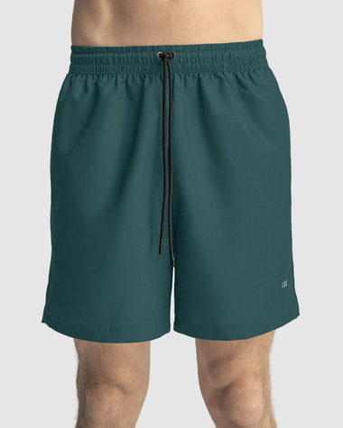 Pantaloneta deportiva con bolsillos funcionales#color_678-verde