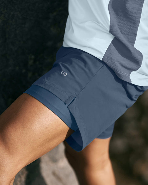 Pantaloneta deportiva con bóxer interno#color_457-azul
