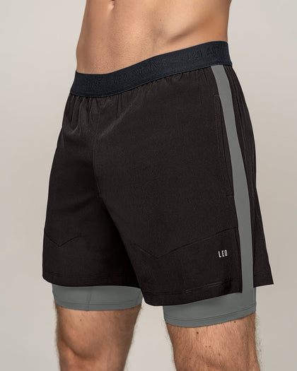 Pantaloneta deportiva con bóxer interno fijo#color_700-negro
