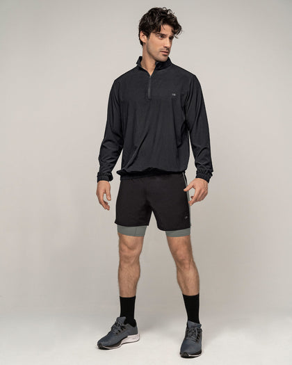 Pantaloneta deportiva con bóxer interno fijo#color_700-negro