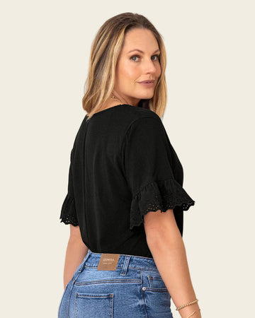 Blusa con detalle en mangas#color_700-negro