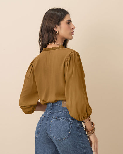 Blusa manga 3/4 con elástico en puños#color_847-mostaza
