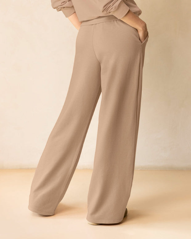 Pantalón bota amplia con elástico y tira anudable en cintura