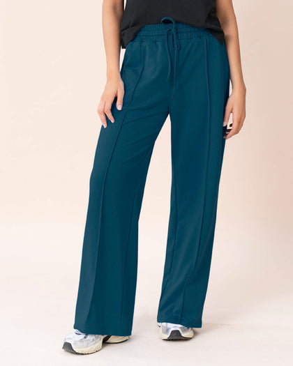 Pantalón tipo jogger con bota ancha#color_540-azul-navy