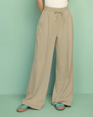 Pantalón tipo jogger con bota ancha#color_606-arena