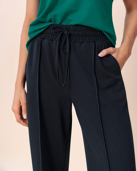 Pantalón tipo jogger con bota ancha#color_700-negro