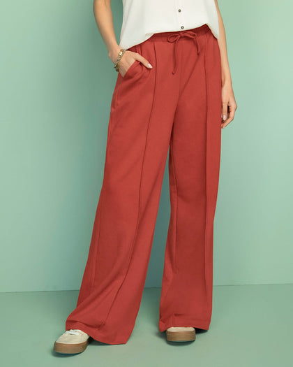 Pantalón tipo jogger con bota ancha#color_a89-terracota