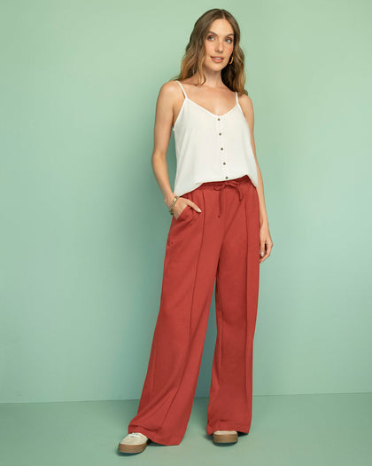 Pantalón tipo jogger con bota ancha#color_a89-terracota