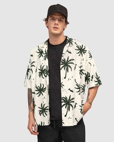 Camisa manga corta tipo hawaiana oversized#color_038-blanco-estampado-palmera