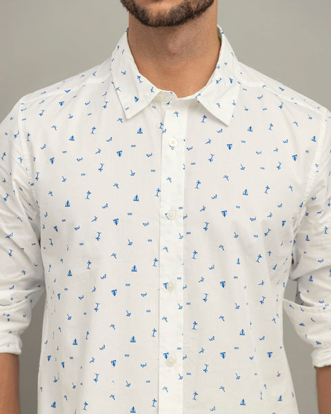 Camisa manga larga con botones#color_a57-blanco-estampado-azul