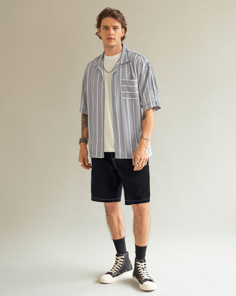 Camisa manga corta silueta oversized#color_711-gris