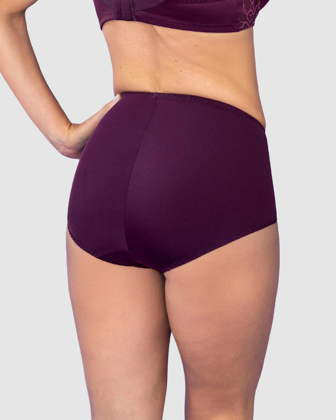 Panty clásico de compresión suave con toques de encaje en abdomen#color_a97-uva